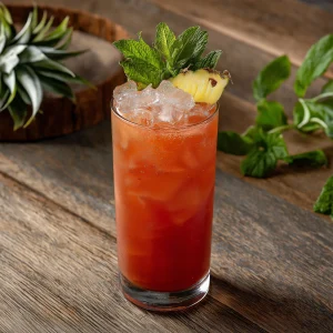 Rumshack Punch görs med navyrom, overproof rom, persikipuree, persikoschnapps, limejice, ananasjuice & greandine