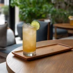 Stone Wheel med tequila, limejuice, grön chartreuse, vaniljsockerlag, ingefärssockerlag & cider