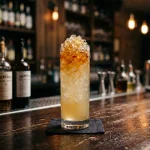 Monkey Business med gin, bananlikör, honung, citronjuice & limejuice